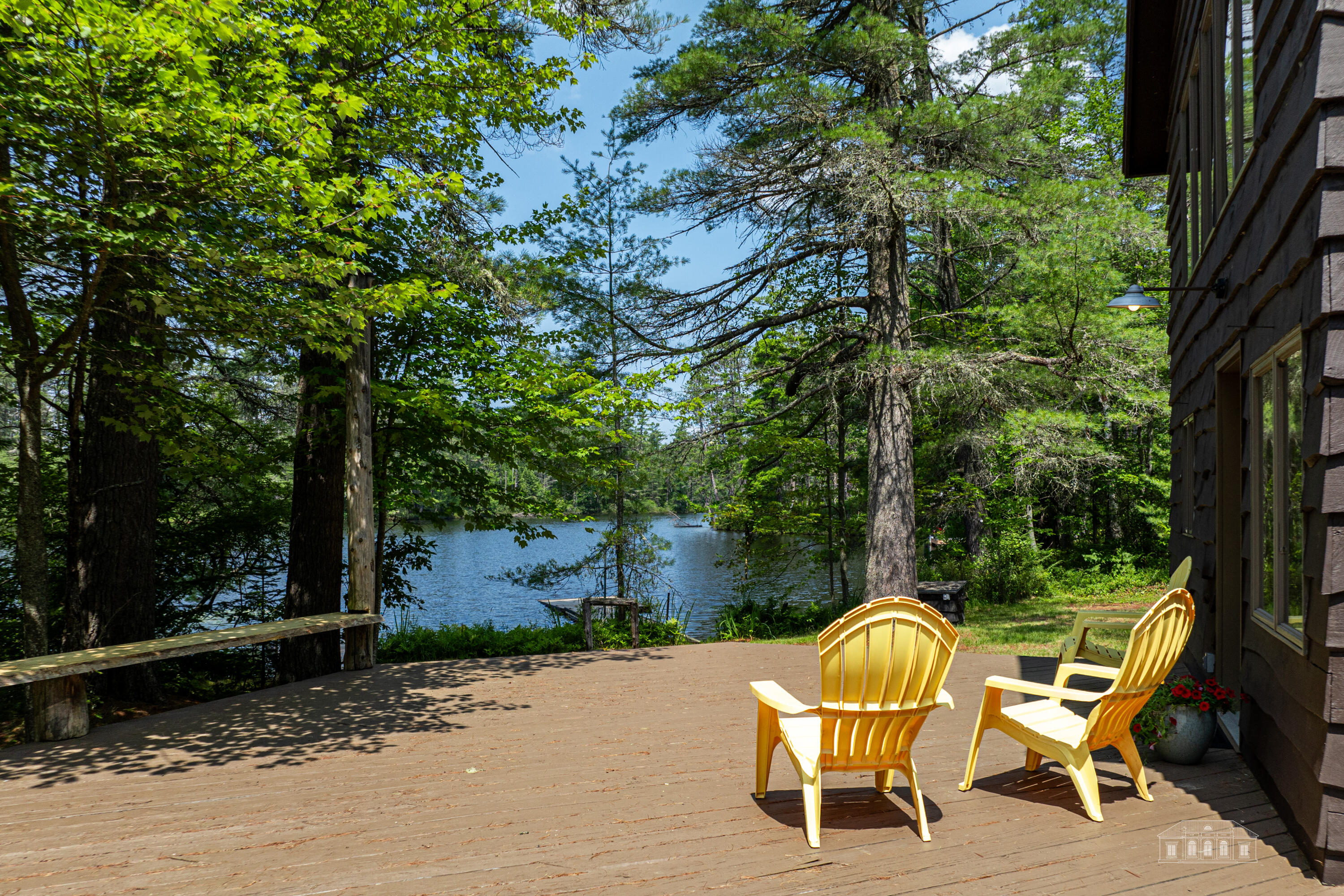 81 Hull Road Rainbow Lake, NY 12976 - Photo 20 of 62 Main deck looking onto lake