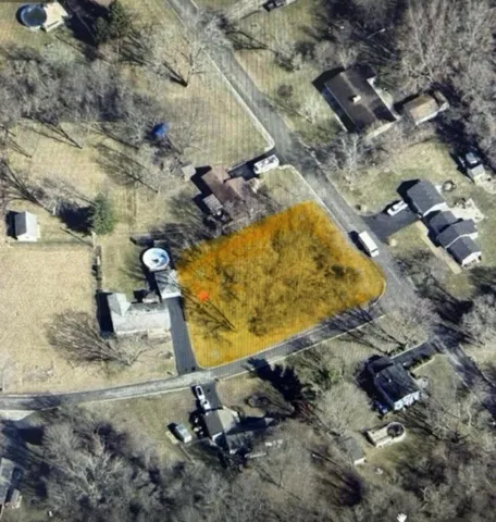 a view of backyard with green space