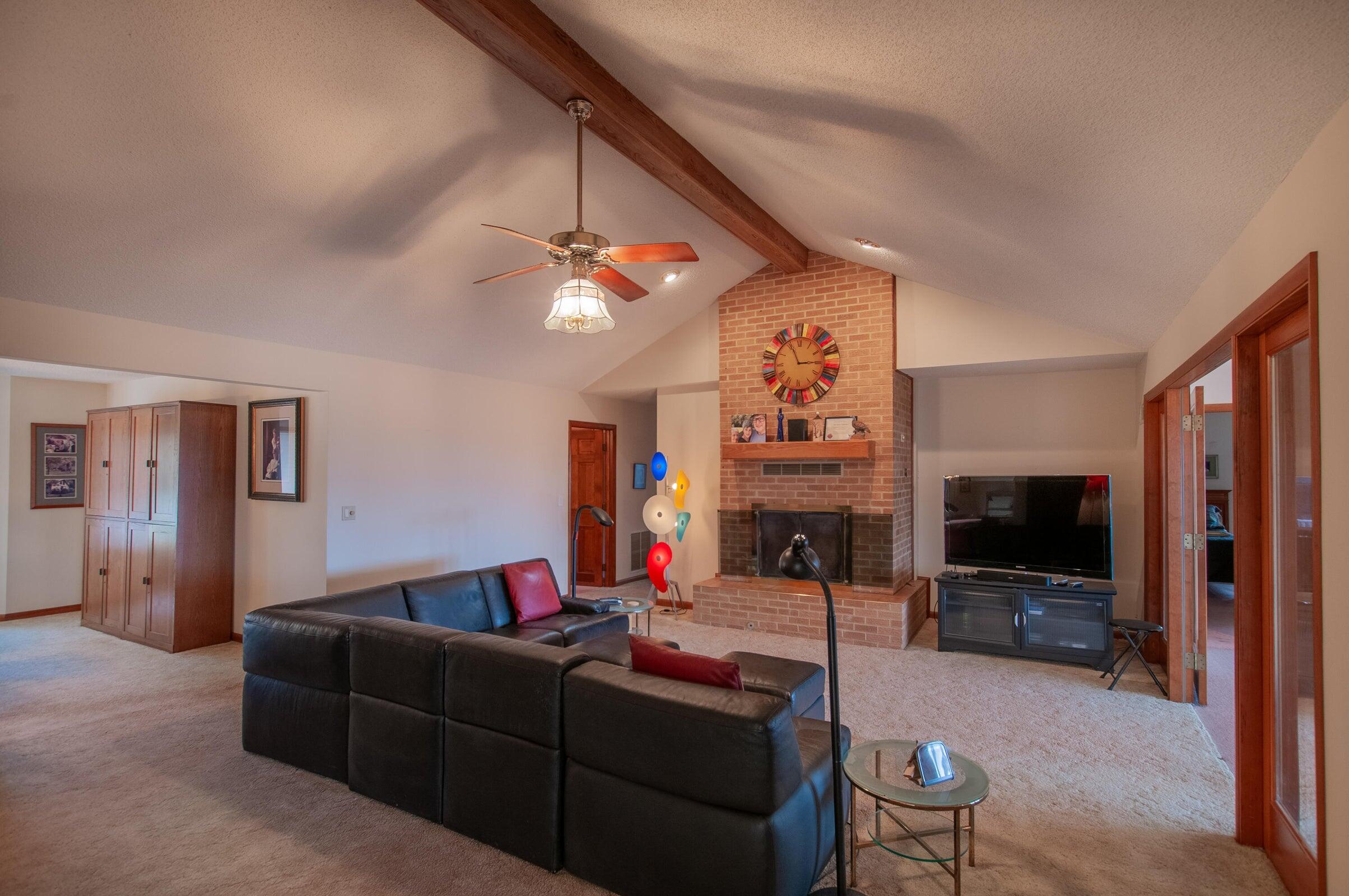 106 Merrick Lane Raphine, VA 24472 - Photo 12 of 46 a living room with furniture and a flat screen tv