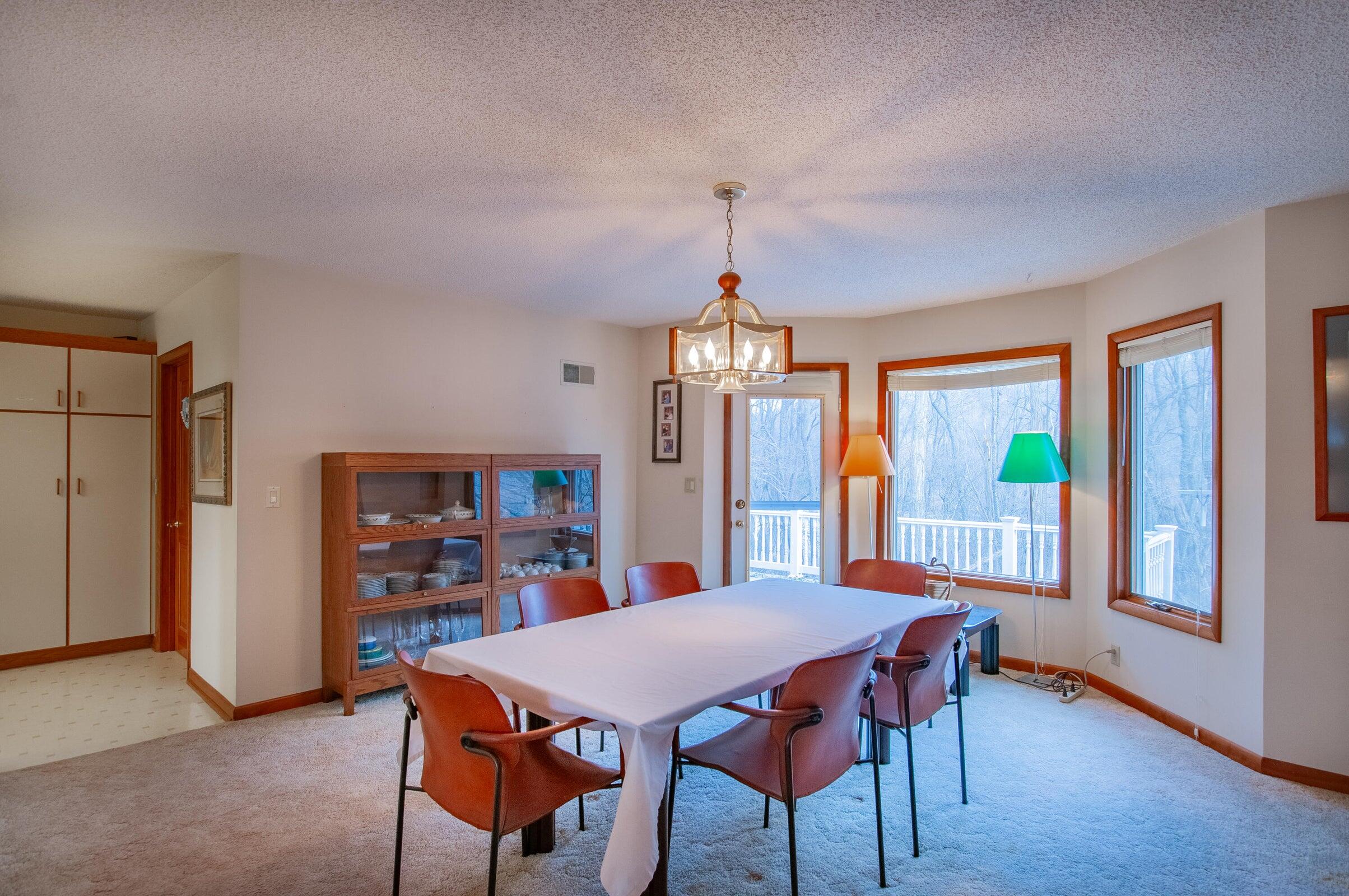 106 Merrick Lane Raphine, VA 24472 - Photo 17 of 46 a view of a dining room with furniture window and wooden floor