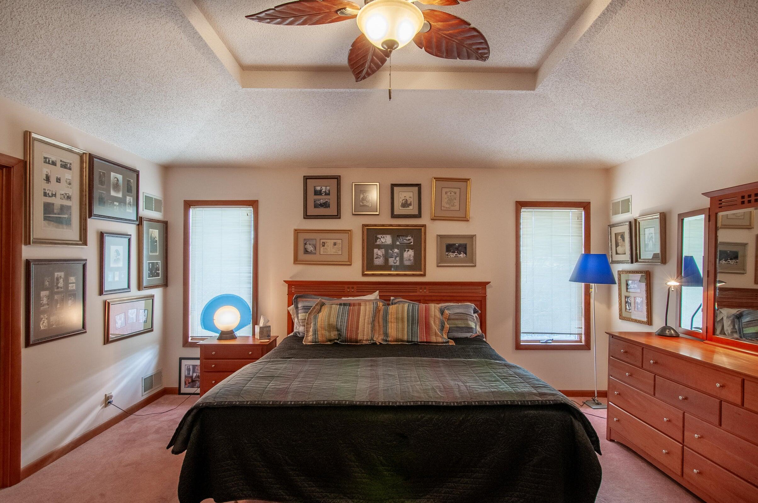 106 Merrick Lane Raphine, VA 24472 - Photo 21 of 46 a bedroom with a bed and wooden floor