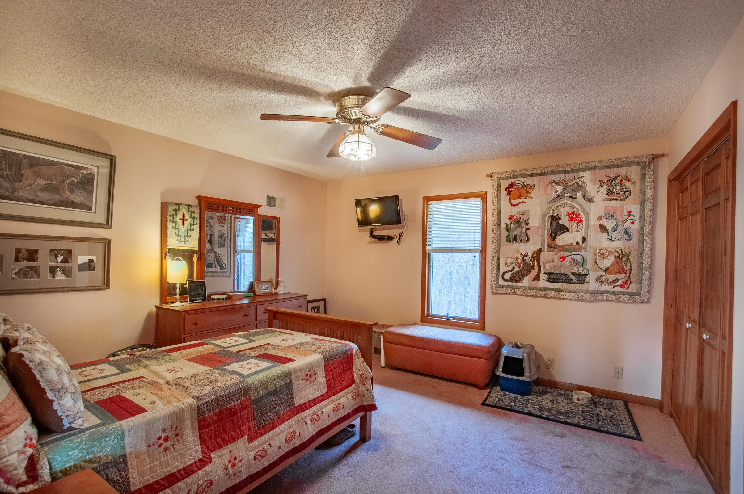 106 Merrick Lane Raphine, VA 24472 - Photo 25 of 46 a bedroom with a bed dresser and window