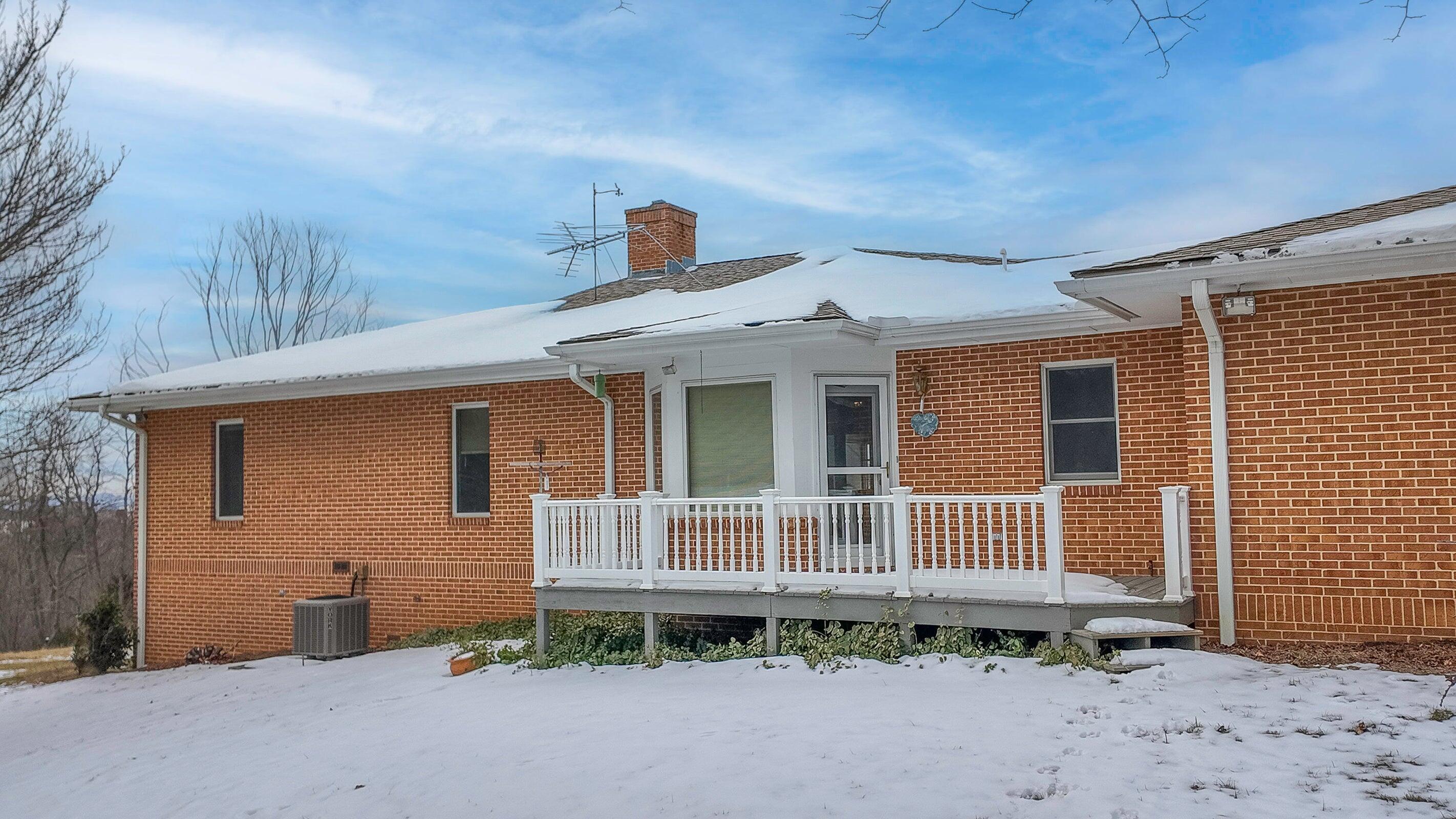 106 Merrick Lane Raphine, VA 24472 - Photo 39 of 46 a front view of a house with a yard