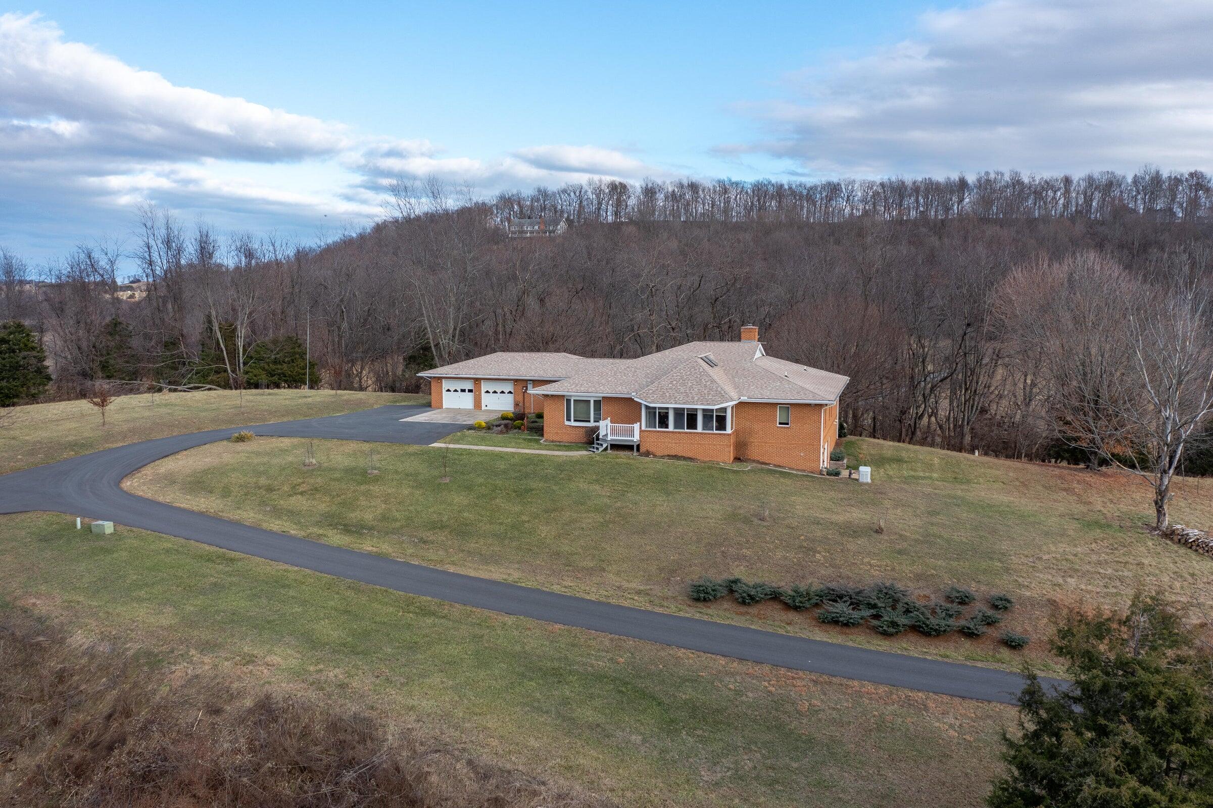 106 Merrick Lane Raphine, VA 24472 - Photo 5 of 46 a view of a town with mountains in the background