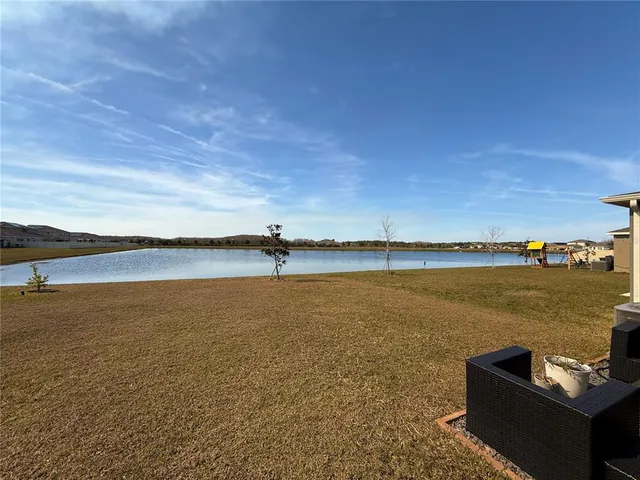 a view of an ocean and city