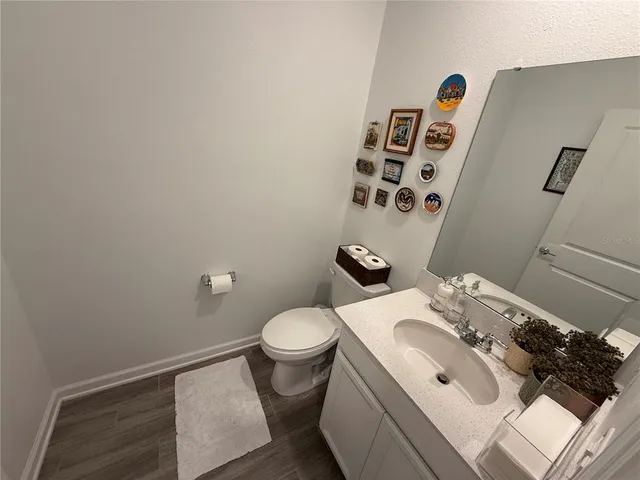 a bathroom with a sink and toilet