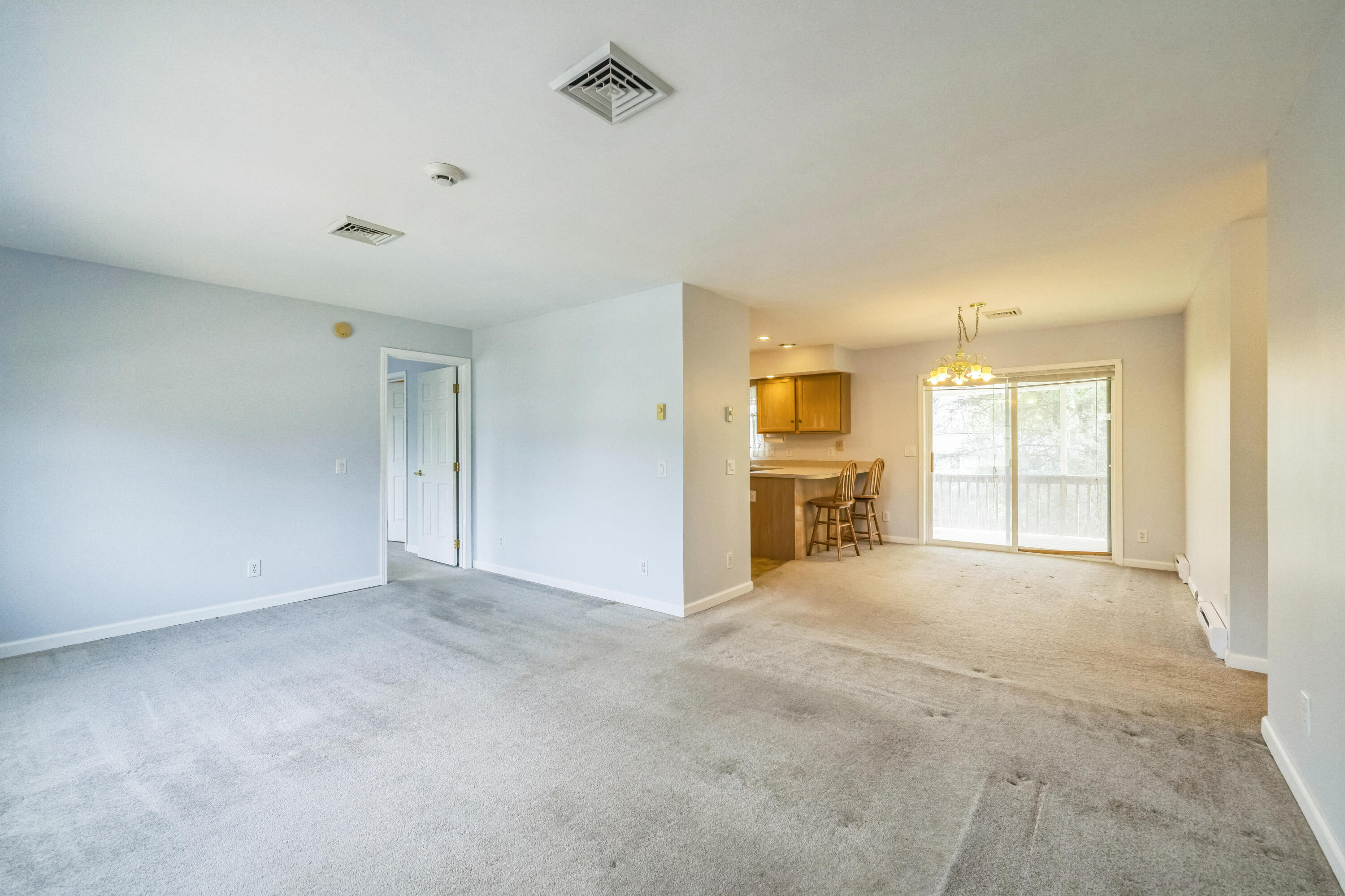 204 Weiss Road Stroudsburg, PA 18360 - Photo 13 of 30 a view of an empty room with a window and kitchen view