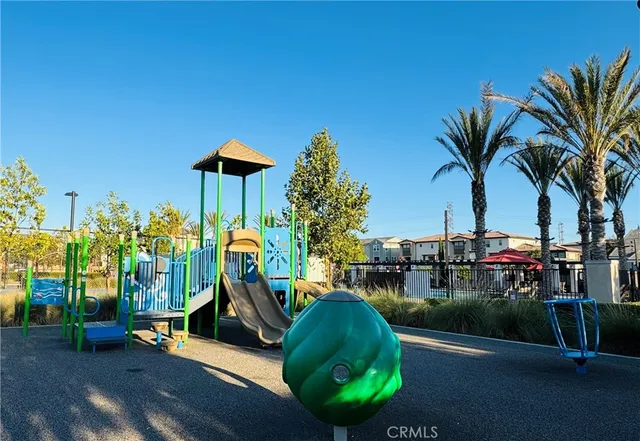 a view of a chairs and table in the patio