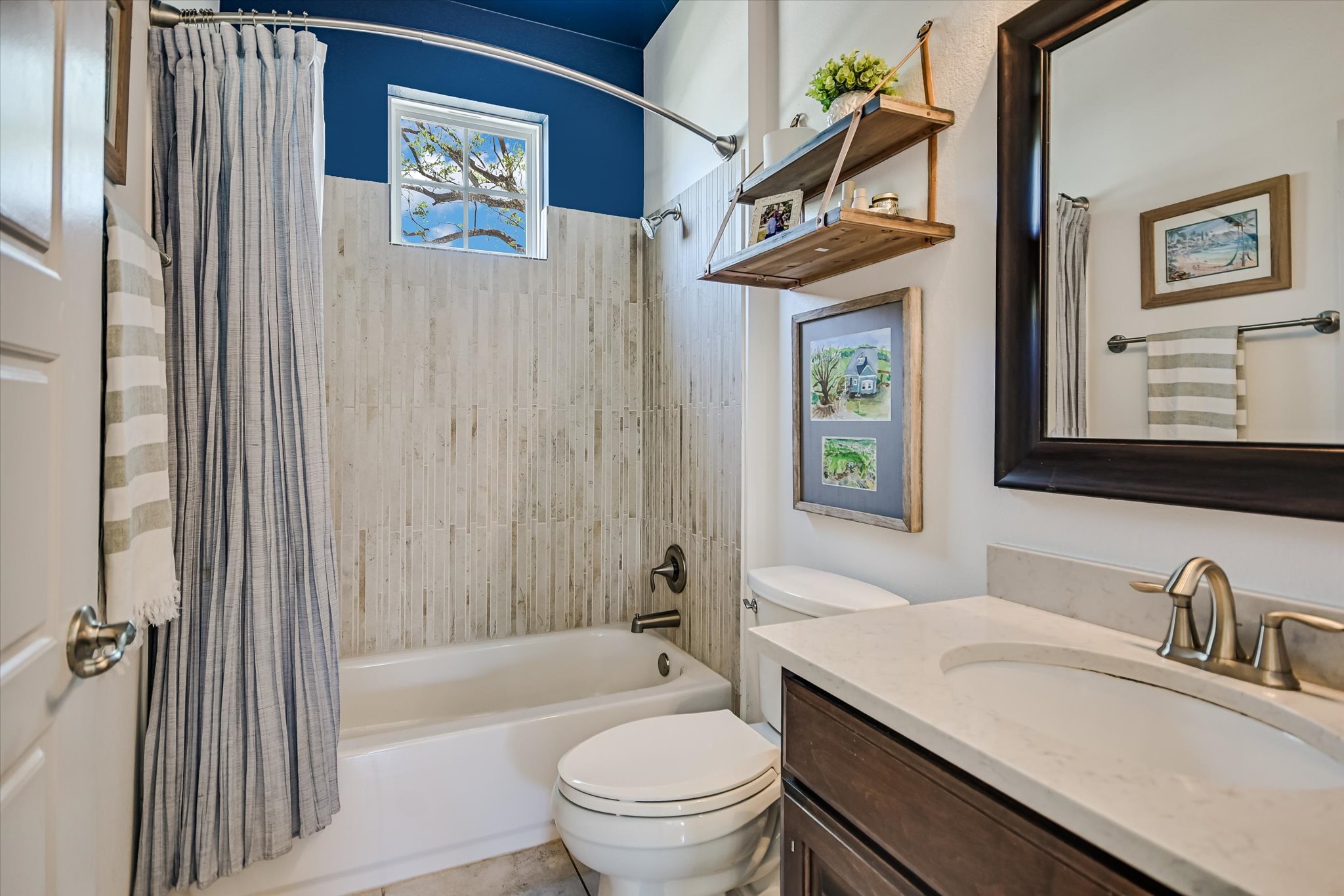 12224 Tawny Farms Road, Unit 145 Austin, TX 78748 - Photo 11 of 27 Full bathroom featuring vanity and shower / bath combo