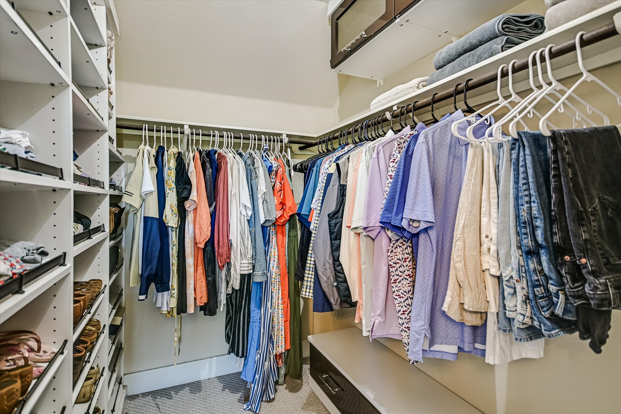 12224 Tawny Farms Road, Unit 145 Austin, TX 78748 - Photo 14 of 27 The primary closet features a custom built organizer system!