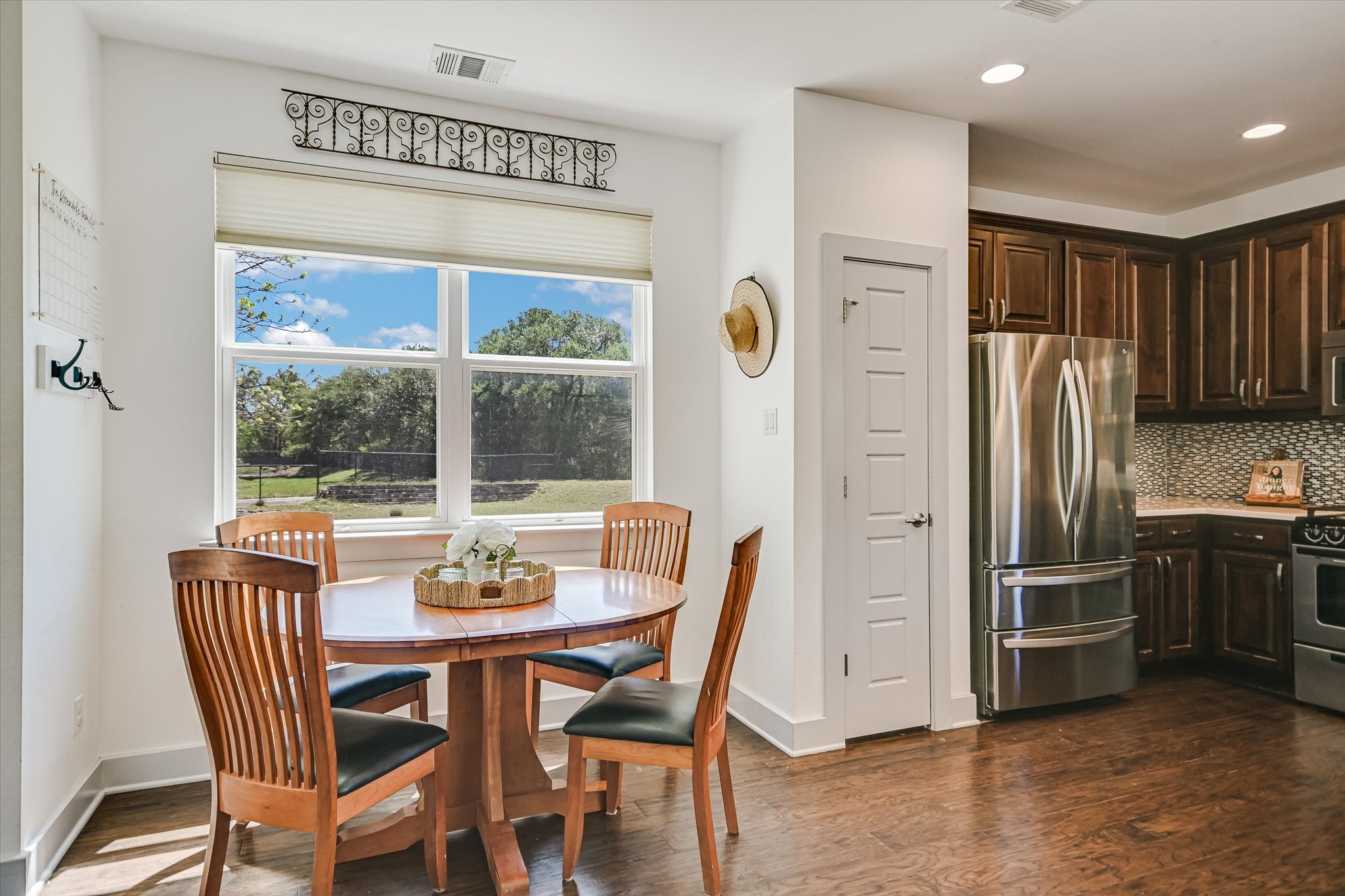 12224 Tawny Farms Road, Unit 145 Austin, TX 78748 - Photo 25 of 27 This sweet cottage packs it all in: dining area, kitchen and living room are all together for a cozy and still spacious floor plan.