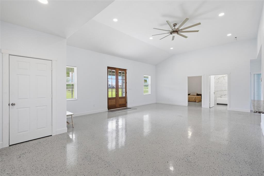 151 Kasberg Road Leroy, TX 76691 - Photo 5 of 40 a view of a livingroom with a ceiling fan and window