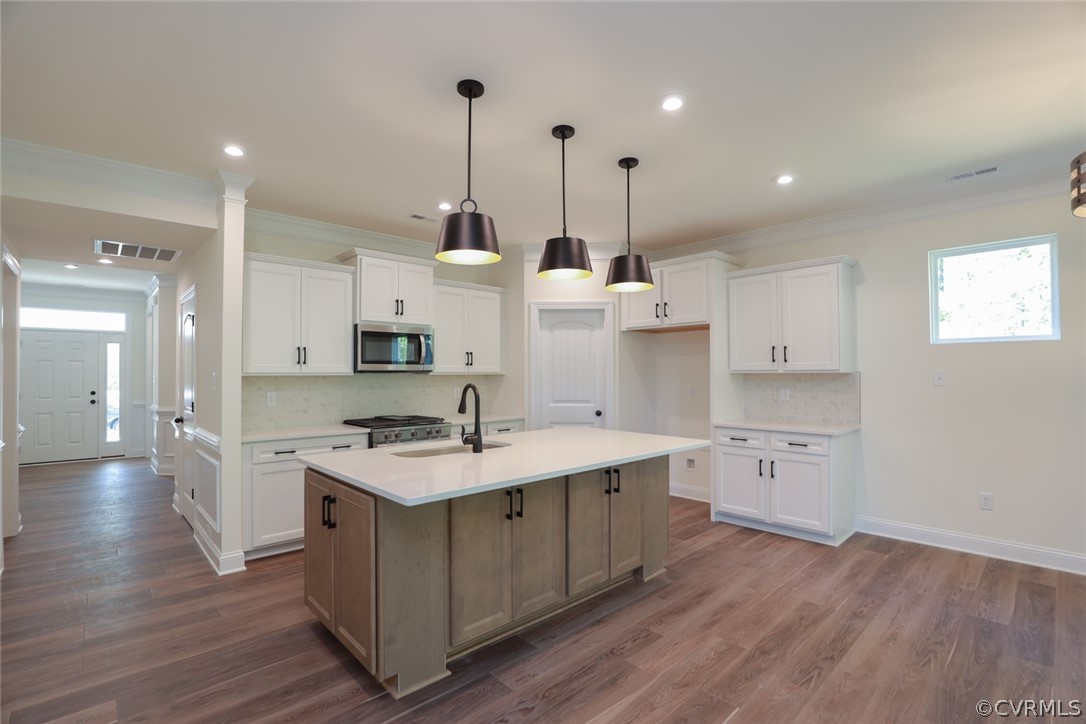 1706 Twin Rivers Court Chester, VA 23836 - Photo 7 of 32 Kitchen with quartz countertops, island, walk-in p