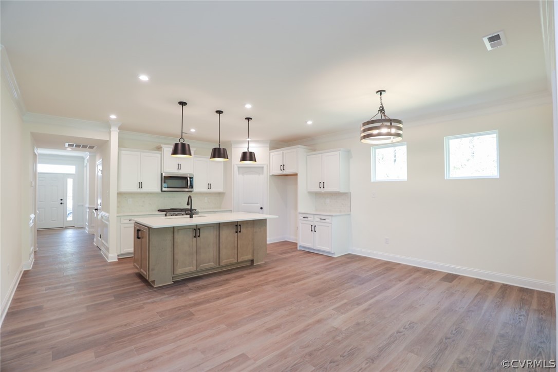 1706 Twin Rivers Court Chester, VA 23836 - Photo 8 of 32 Kitchen with quartz countertops, island, walk-in p