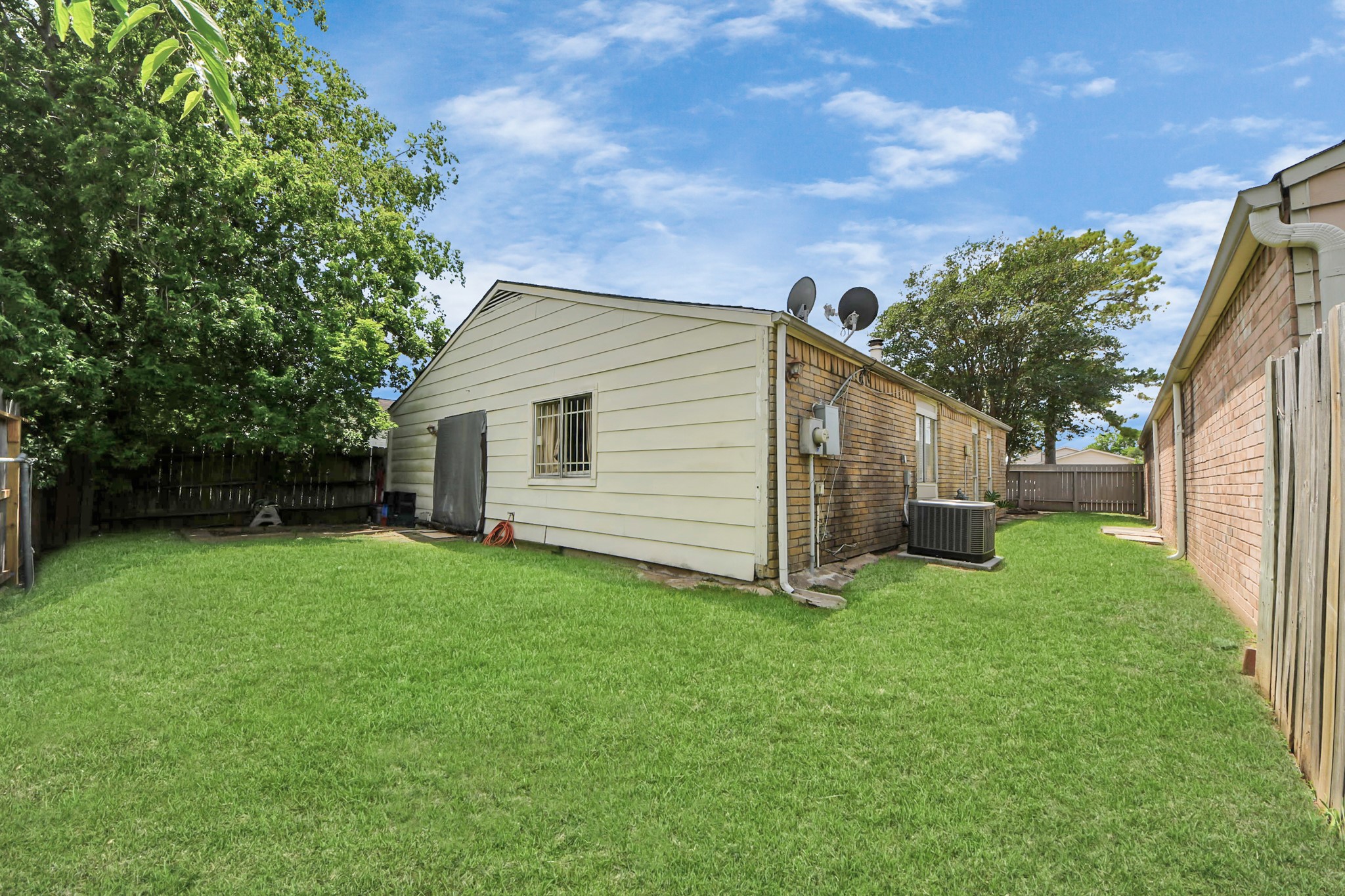 4155 Amir Street Houston, TX 77072 - Photo 42 of 43 a view of a backyard with a house