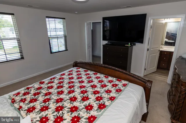 a room with a sink and a mirror