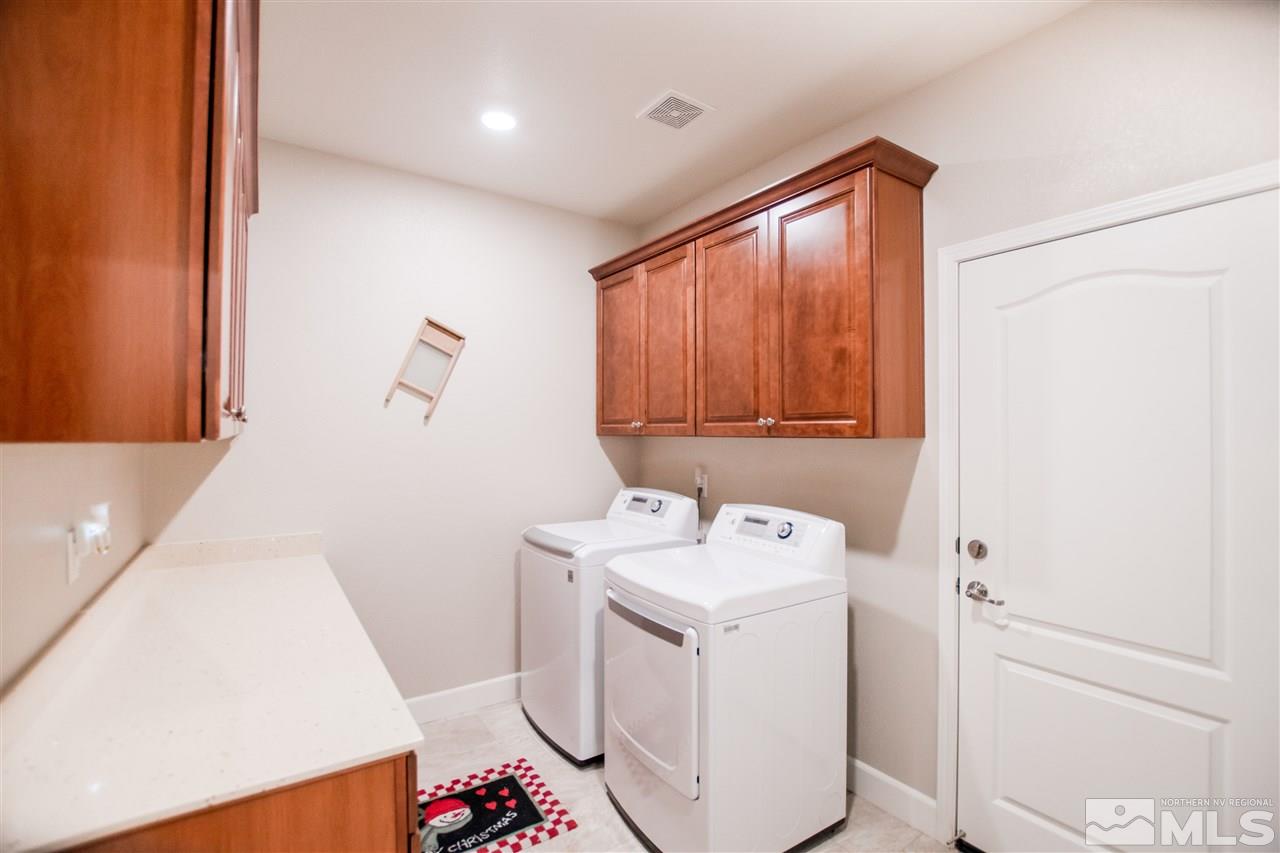 1705 Scott Valley Road Reno, NV 89523 - Photo 12 of 16 a utility room with dryer and washer