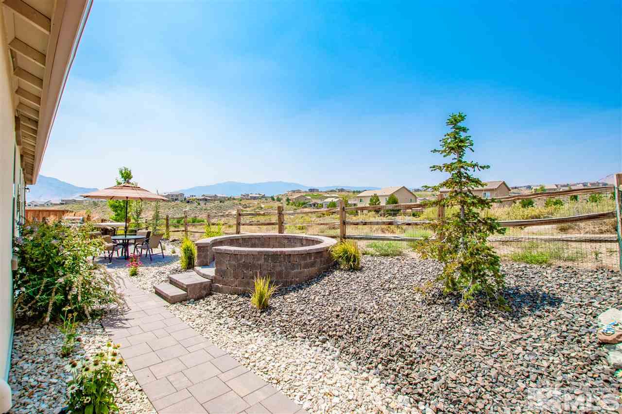 1705 Scott Valley Road Reno, NV 89523 - Photo 14 of 16 a view of a backyard with plants and lake view