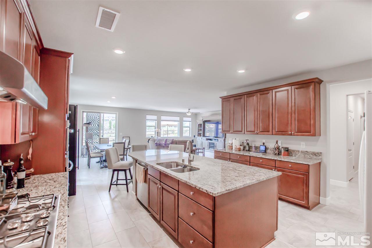 1705 Scott Valley Road Reno, NV 89523 - Photo 4 of 16 a kitchen with sink stove and cabinets