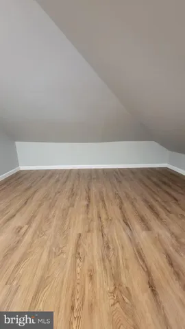 a view of a hallway with staircase