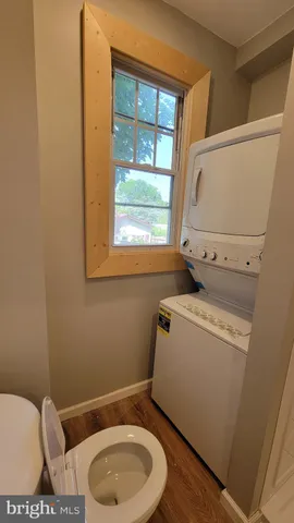 a bathroom with a toilet and a sink
