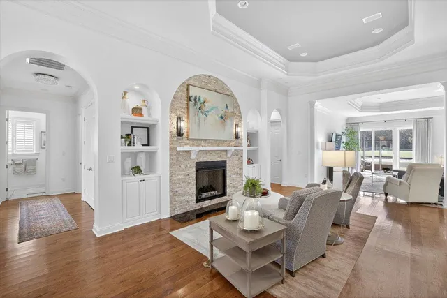 a view of a house with swimming pool and a yard