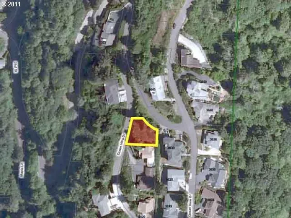 an aerial view of house with outdoor space and swimming pool