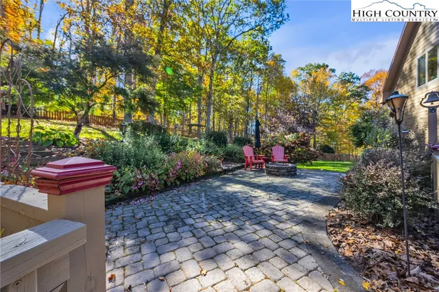 a garden view with a seating space
