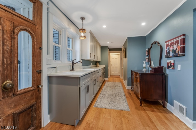 21 Frontage Road Blairstown, NJ 07825 - Photo 17 of 49 a large kitchen with stainless steel appliances granite countertop a sink and wooden cabinets