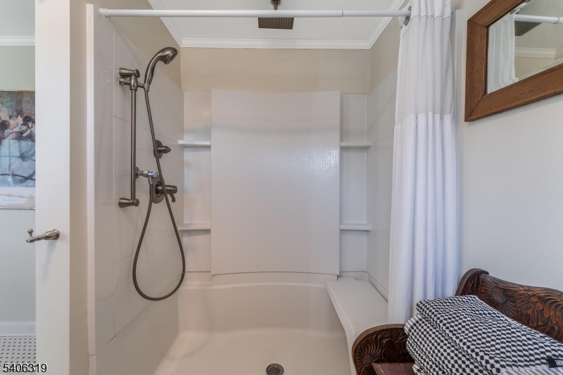 21 Frontage Road Blairstown, NJ 07825 - Photo 23 of 49 a bathroom with a glass shower door