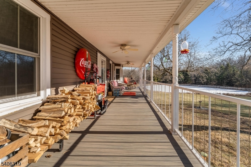 21 Frontage Road Blairstown, NJ 07825 - Photo 5 of 49 a view of balcony with wooden floor and seating space