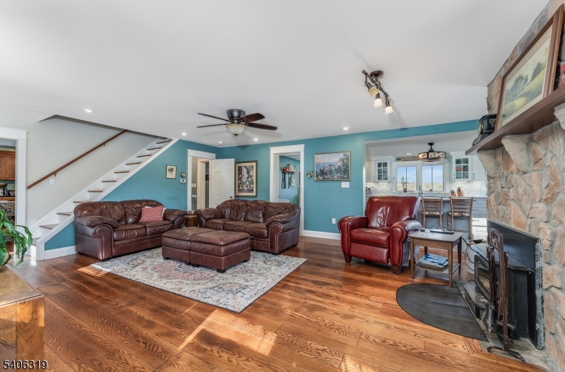 21 Frontage Road Blairstown, NJ 07825 - Photo 6 of 49 a living room with furniture and a fireplace
