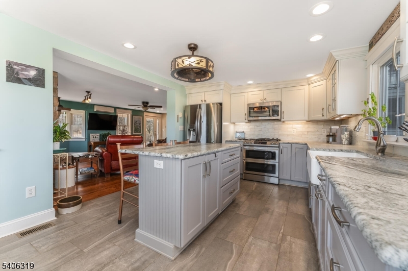 21 Frontage Road Blairstown, NJ 07825 - Photo 9 of 49 a kitchen with a sink cabinets and stainless steel appliances