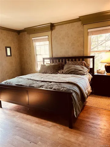 a room with a dresser and a mirror