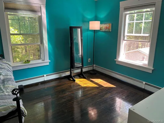 a room with furniture and a window