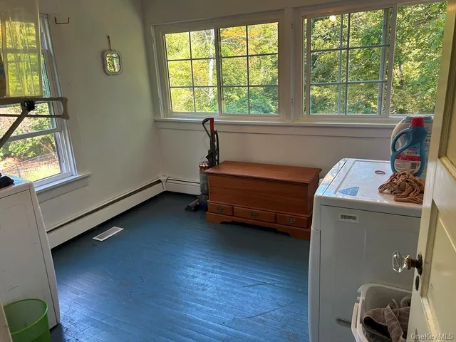 a bathroom with a sink double vanity and mirror