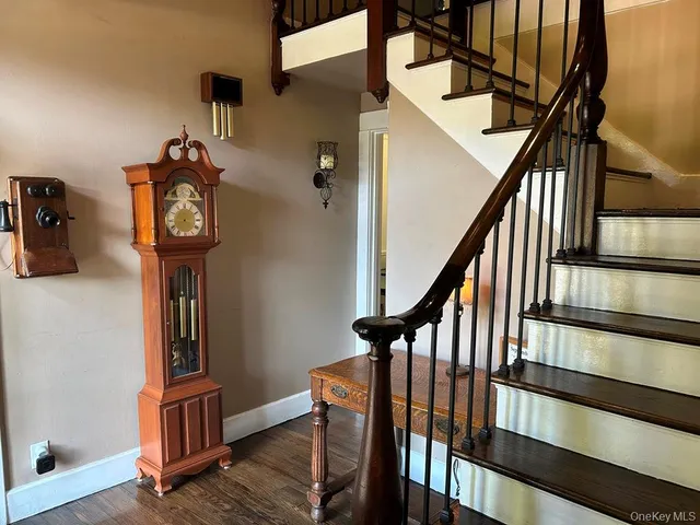 a view of stairs with furniture