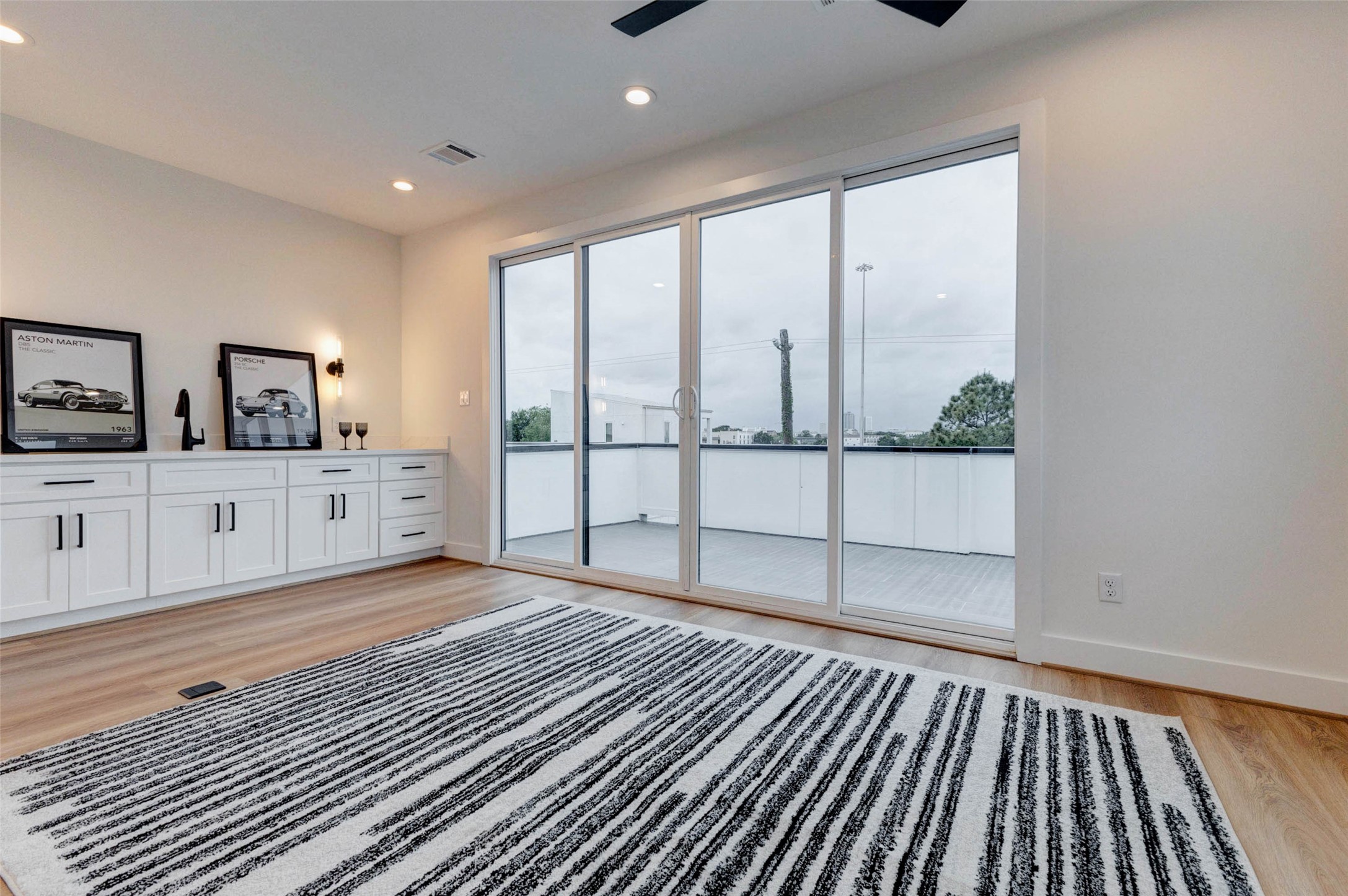 3309 St Emanuel Street Houston, TX 77004 - Photo 46 of 47 Elevate your living experience with a stunning third-floor sky lounge, complete with a convenient sink and bathroom.