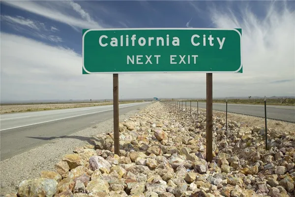 a sign board with an empty space