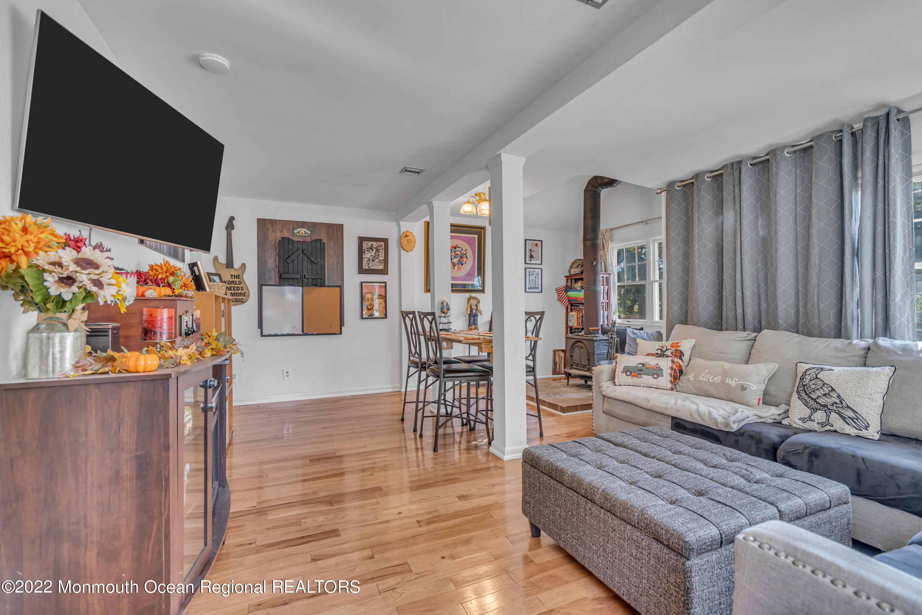 415 Shady Lane Howell, NJ 07731 - Photo 3 of 20 a living room with furniture and a flat screen tv