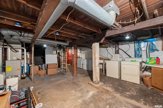 a view of a garage with table and chairs
