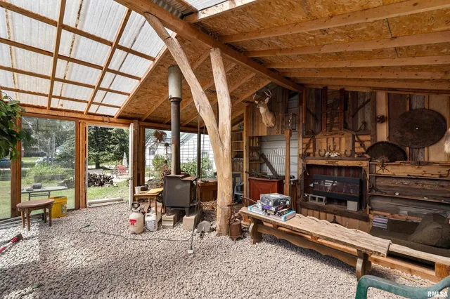 a room with furniture and a large window