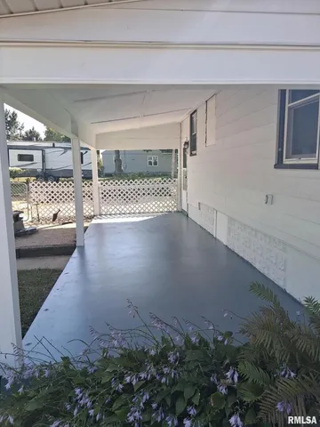 a view of a hardwood floor in a room