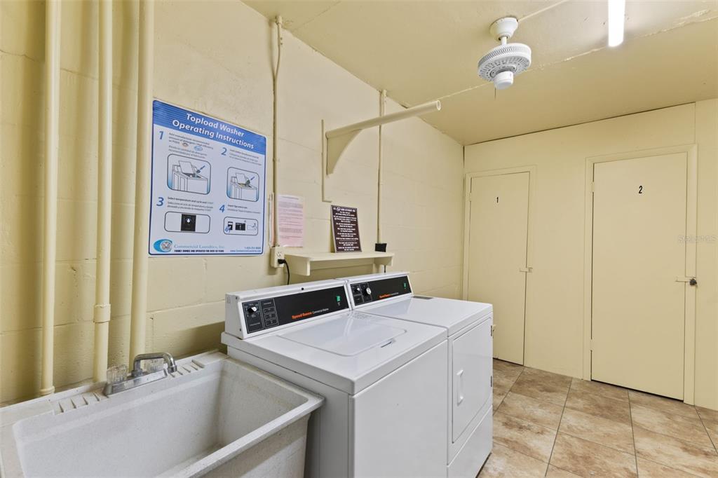 4550 Cove Circle, Unit 501 St. Petersburg, FL 33708 - Photo 37 of 44 a bathroom with a sink and a mirror