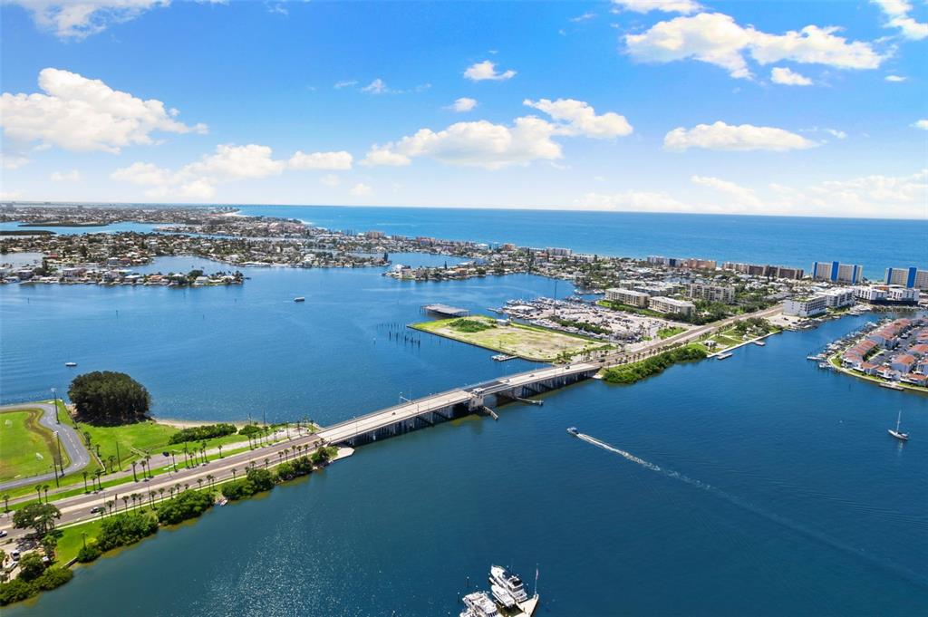 4550 Cove Circle, Unit 501 St. Petersburg, FL 33708 - Photo 41 of 44 a view of a lake with a city view
