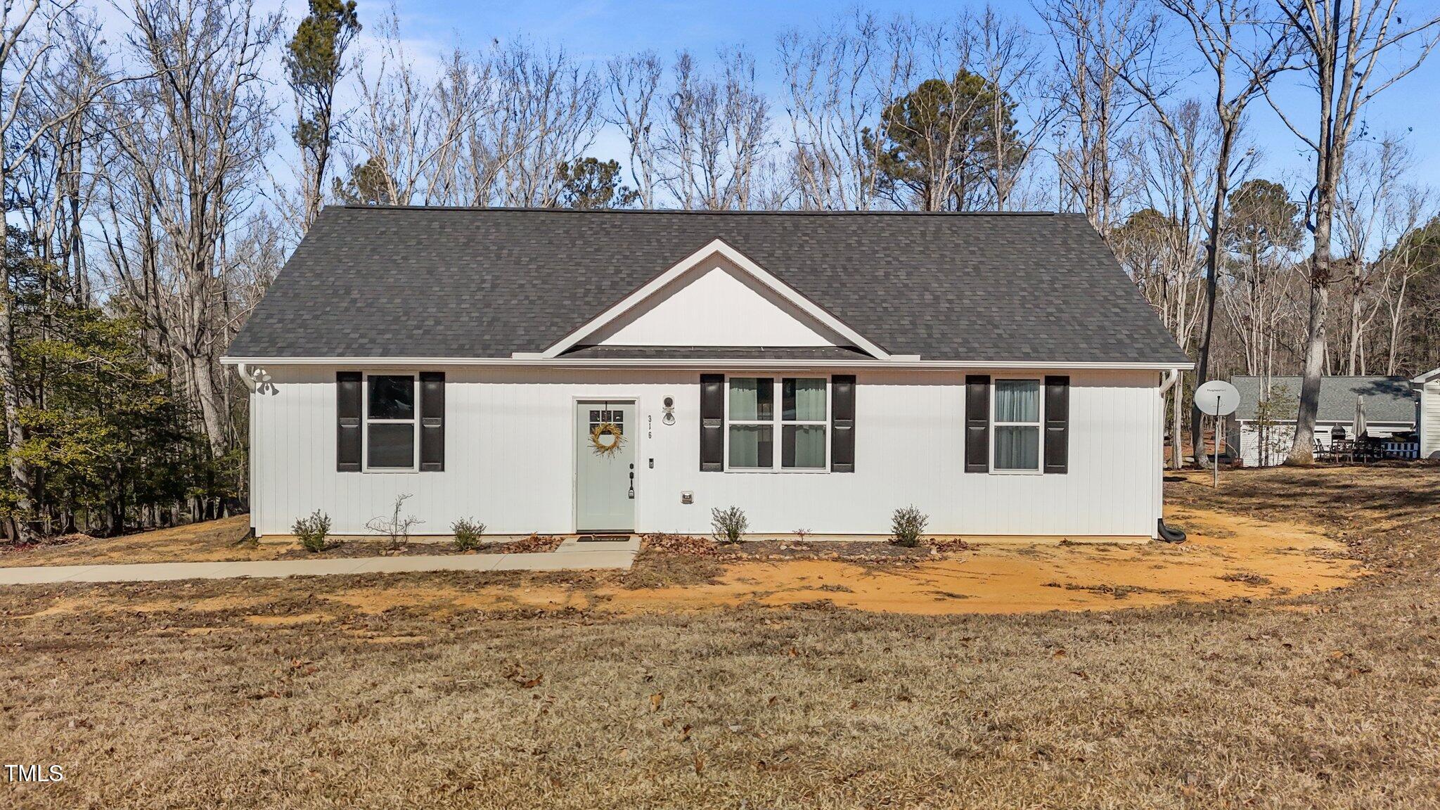 316 Jasmine Road Fuquay-Varina, NC 27526 - Photo 1 of 25 3-web-or-mls-DJI_20250128125726_0992_D
