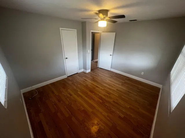 a bathroom with a toilet a sink and bathtub