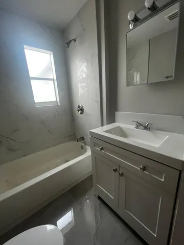 a view of a backyard with furniture