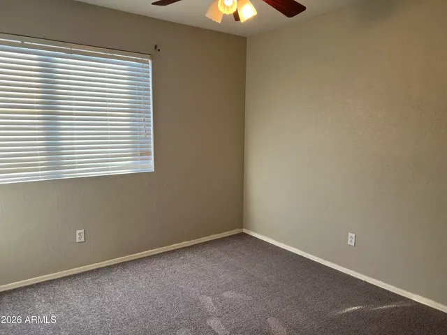 an empty room that has a window