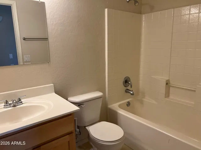 a kitchen with stainless steel appliances granite countertop a stove top oven